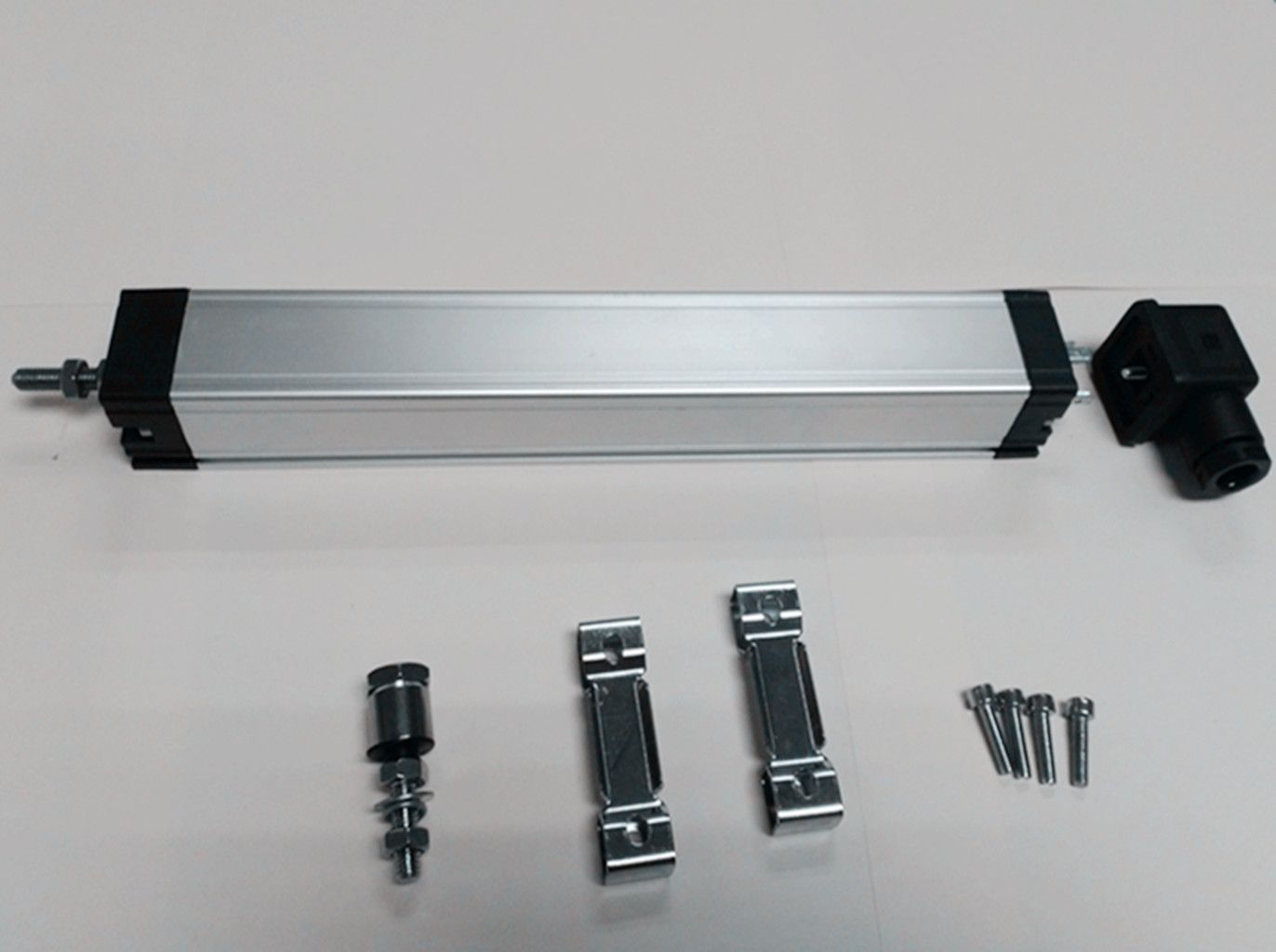 Air-Actuated Control System Usage Rectilinear Motion Proximity Transducer