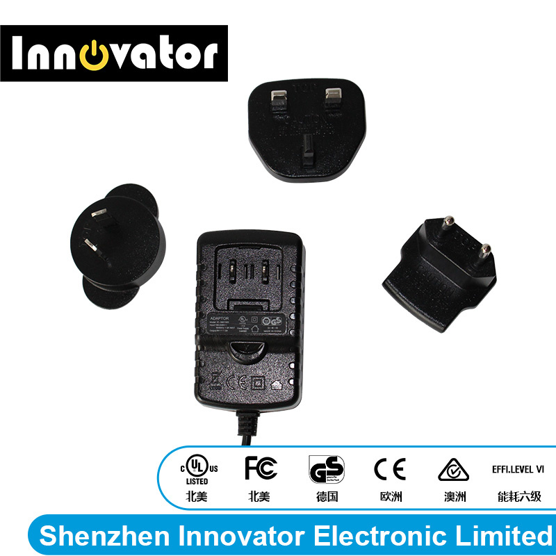 9V 1.5A portable Interchangeable AC DC Adaptor with Us, EU, UK and Au Plugs