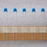 Blue High Voltage Radial Multilayer Ceramic Capacitor (TMCC03)