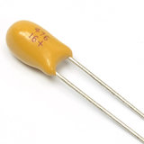 Yellow Color Radial Type Tantalum Capacitor